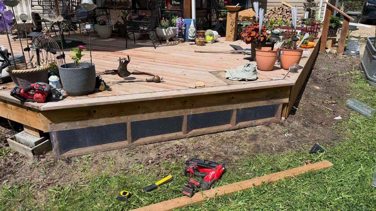 Deck skirting, screen and fascia detail finished flush along the base of a deck.